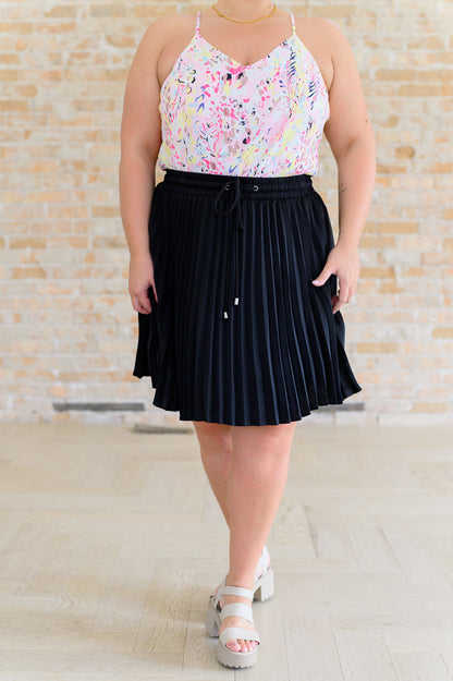 Just a Flirt Pleated Skirt in Black